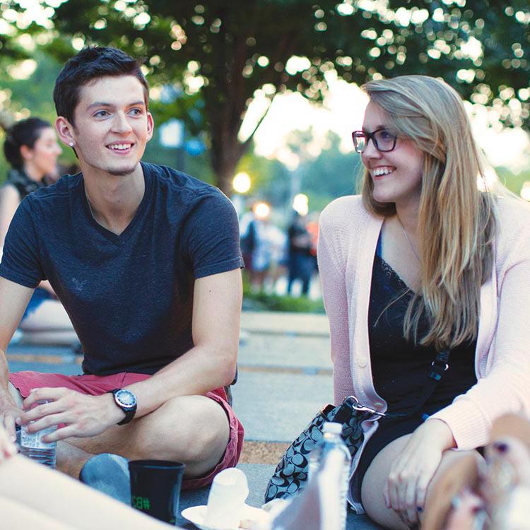 Two students socializing on campus